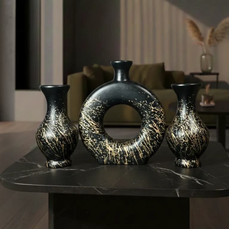 Obsidian Gild Orbit Vase, handcrafted terracotta vase, matte black with gold splatter